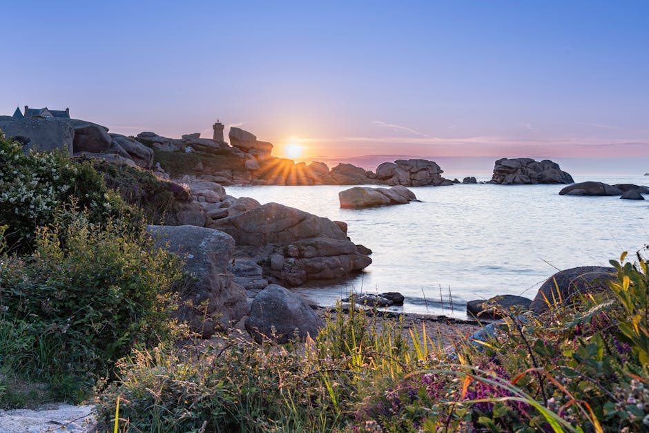 Stunning sunset over rocky shores at Perros-Guirec, Bretagne, France.